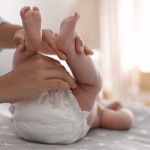 How should one change a diaper for the first time?